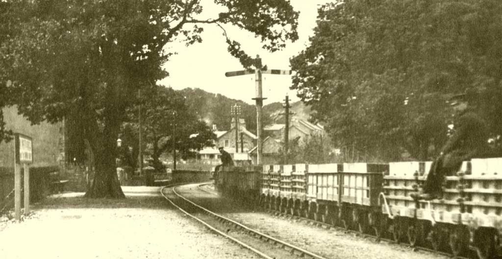 Minffordd in old company days, complete with passing gravity train.